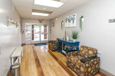 Bright hallway with seating and decorations