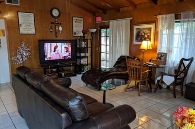 Cozy interior living area with seating and a TV