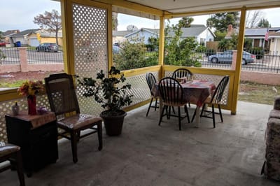 Outdoor seating area with table and chairs