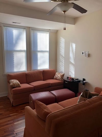 Cozy lounge area with natural light and seating