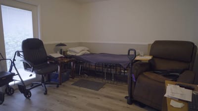 Cozy resident room with a bed and seating