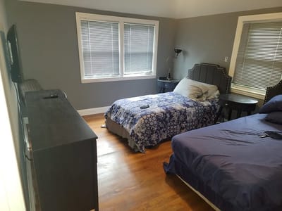Spacious resident bedroom with two beds