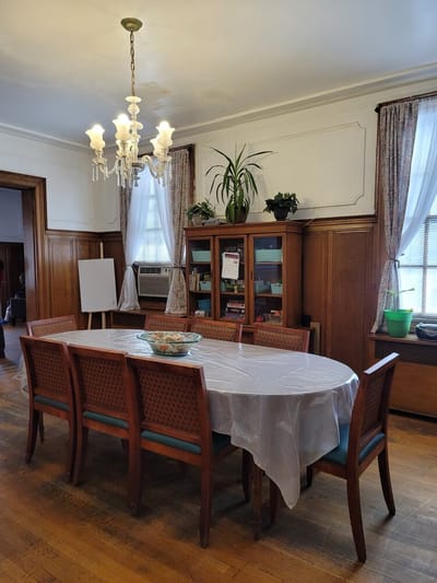 Dining room with a large table and chairs
