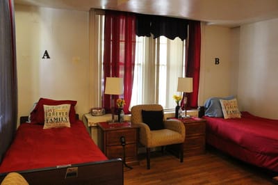 Interior view of a shared bedroom with twin beds