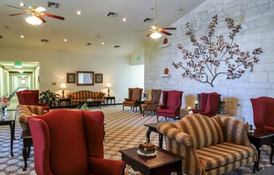 Interior view of a cozy common area with seating