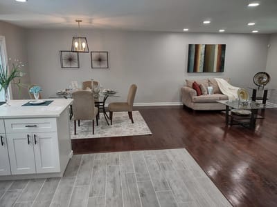 Bright common area with dining table and seating