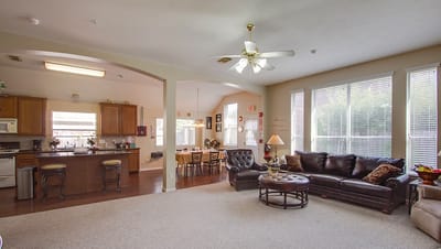 Cozy common area with a couch and kitchen