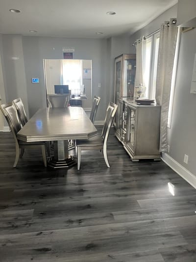 Dining area with a large table and chairs