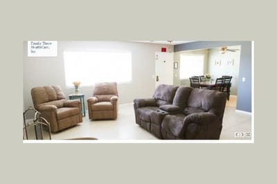 Cozy lounge area with recliner chairs and table