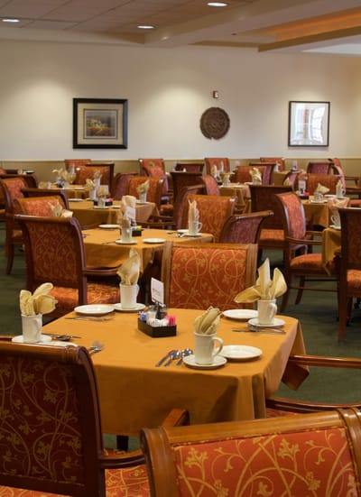Dining area with tables set for meals