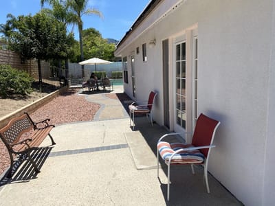 Outdoor seating area with chairs and tables