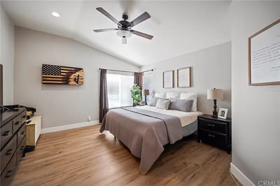 Stylish bedroom with modern decor and wooden flooring