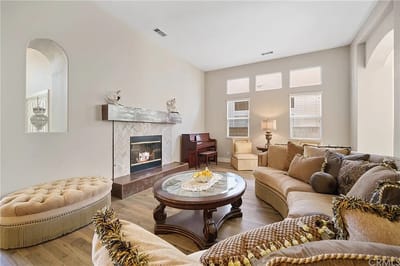 Cozy common area with lounging space and piano