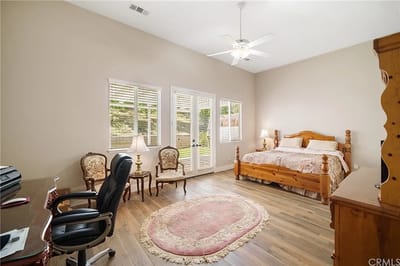 Cozy private room with a bed and seating