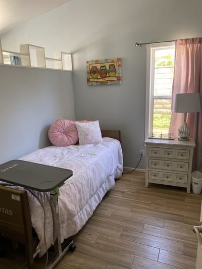 Cozy bedroom with window and decorations