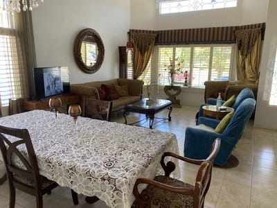 Interior common area with a dining table and seating