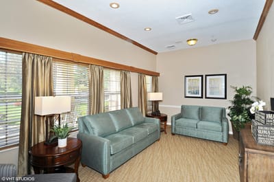 Cozy common area with couches and lamps