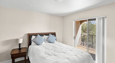 Cozy resident room with balcony access