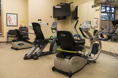 Interior view of a fitness area with exercise equipment