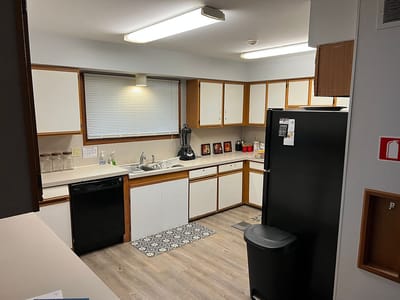 Kitchen area with appliances and workspace
