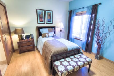 Cozy resident room with natural light and decor