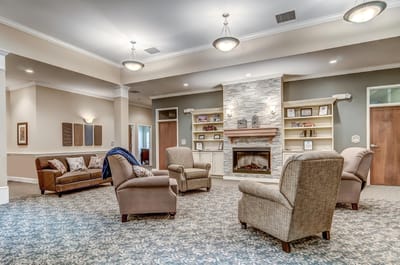Interior common area with comfortable seating and fireplace