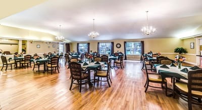 Spacious dining room set for meals with elegant decor