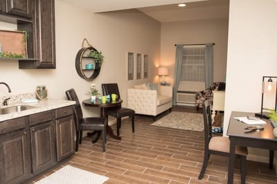 Cozy interior view of a resident unit with seating area