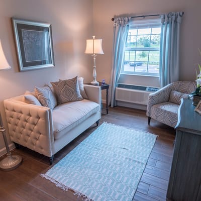 Cozy, well-decorated resident room with natural light