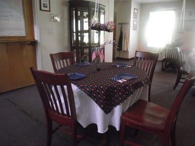 Dining table set for a meal in the facility