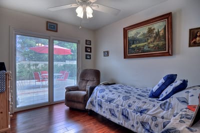 Bright room with a reclining chair and artwork
