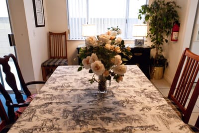 Bright common area with floral decoration
