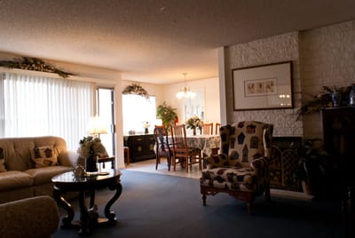 Bright common area with seating and plants