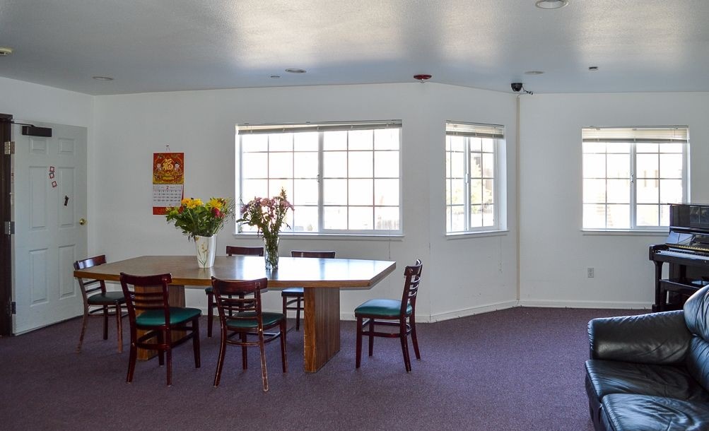 Common area with a dining table and chairs
