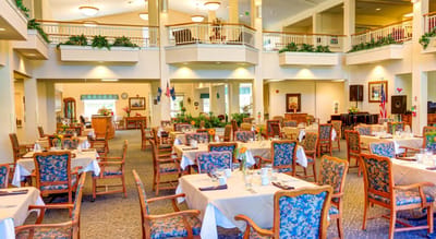 Dining area with beautifully set tables and decor