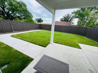 A well-maintained outdoor space with grass and walkways
