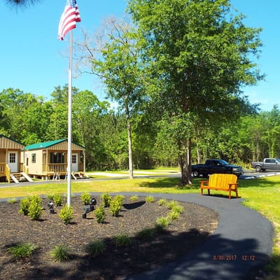 Outdoor pathway with benches and landscaped area
