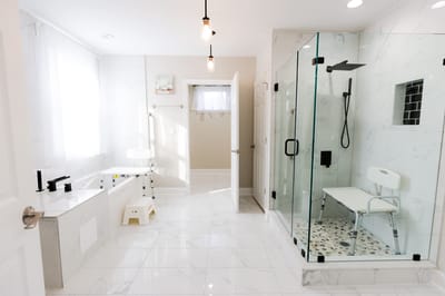 Bright and accessible bathroom with a shower and tub