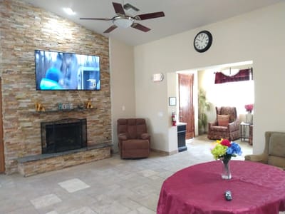 Cozy common area with seating and a TV