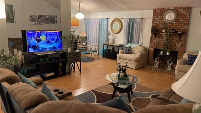 Interior common area with seating and television