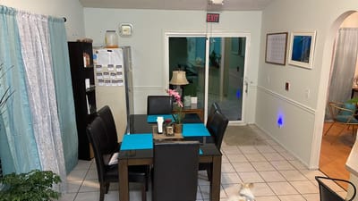 Cozy dining area in a senior facility with a table and seating