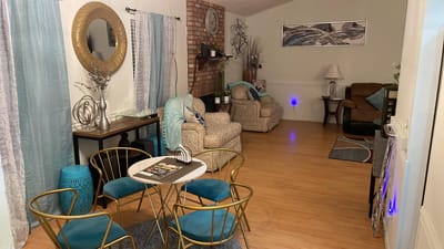 Bright common area featuring comfortable seating