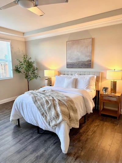 Cozy bedroom setup with a comfortable bed and warm lighting