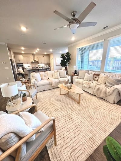 Bright common area with comfortable seating and decor
