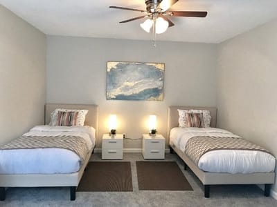 Cozy shared bedroom with twin beds and decor