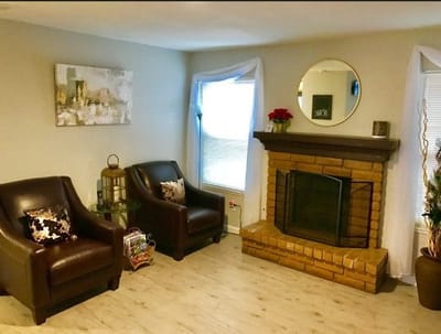 Comfortable seating area with a fireplace