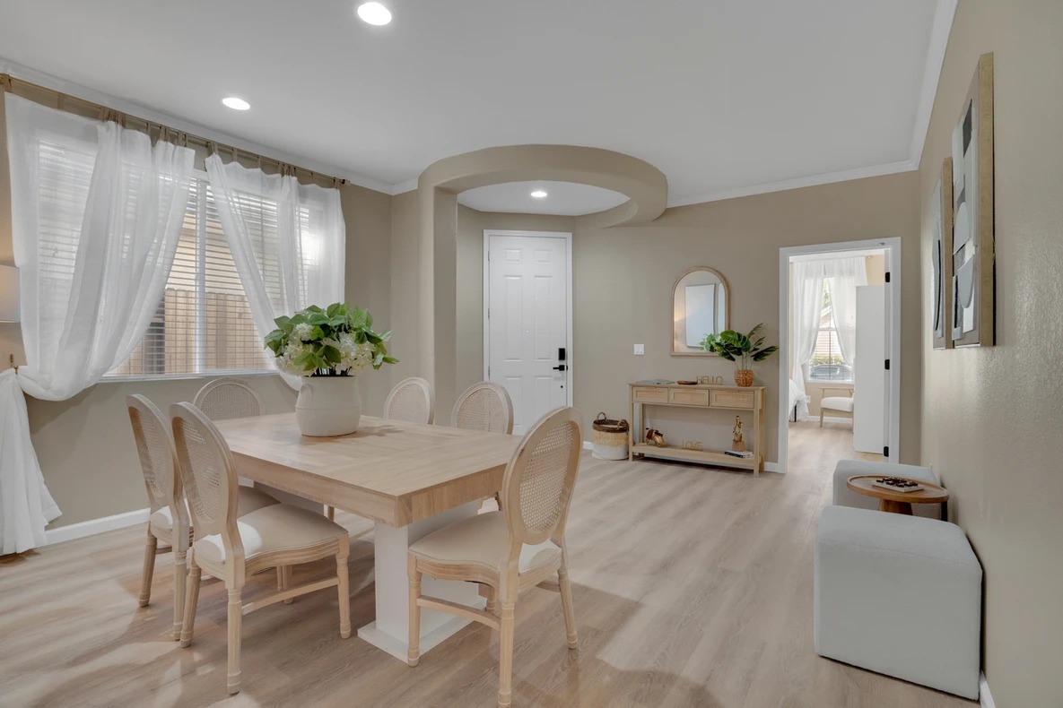 Bright interior of a common area with dining table