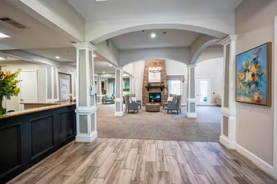 Bright and welcoming common area with a fireplace
