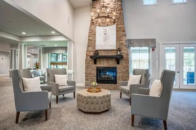 Cozy common area with comfortable seating and fireplace