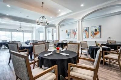 Well-decorated dining room with tables and chairs